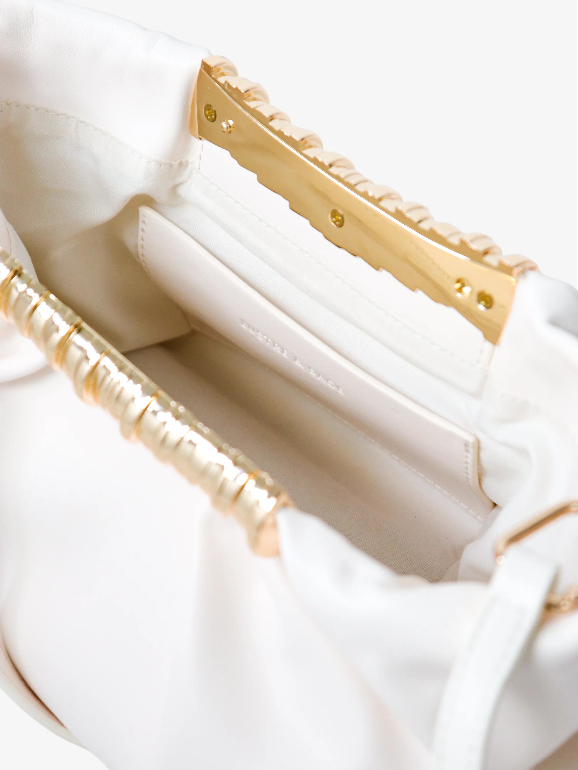 Aura Gathered Clutch Bag in Cream
