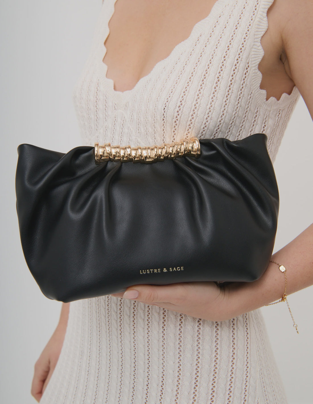 Aura Gathered Clutch Bag in Black